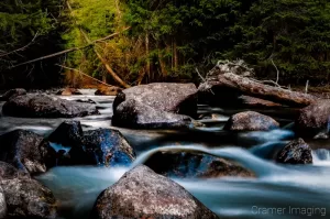 Quality landscape silky water spring with trees and rocks professionally photographed by Cramer Imaging near Alta, Wyoming