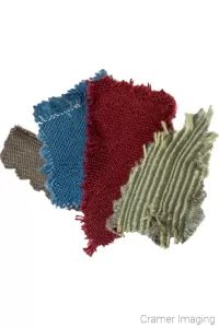 Cramer Imaging's photograph of different colored fabric swatches on a white background