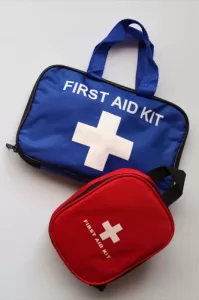 Photograph of a first aid kit bag in blue and red