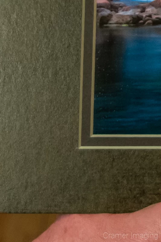 Close-up photograph example of a double layer mat on a picture as done by Audrey Cramer Photography