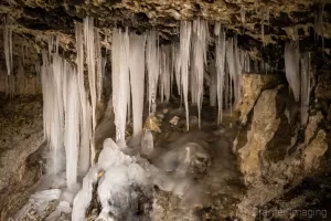 Cramer Imaging's fine art nature photograph of icicles hanging down as stalagmites in a cave