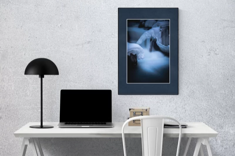 Photograph of Cramer Imaging's landscape photo titled "Ice Castle" in an office or home office setting