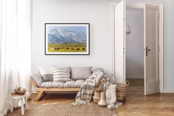 Photograph of Cramer Imaging's landscape photo "Tetons and Horses" in a cozy neutral-toned living room