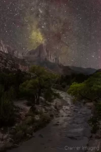 Cramer Imaging's fine art astro landscape photograph of the Milky Way rising over top of the Virgin River and Watchmen peak at Zion National Park Utah