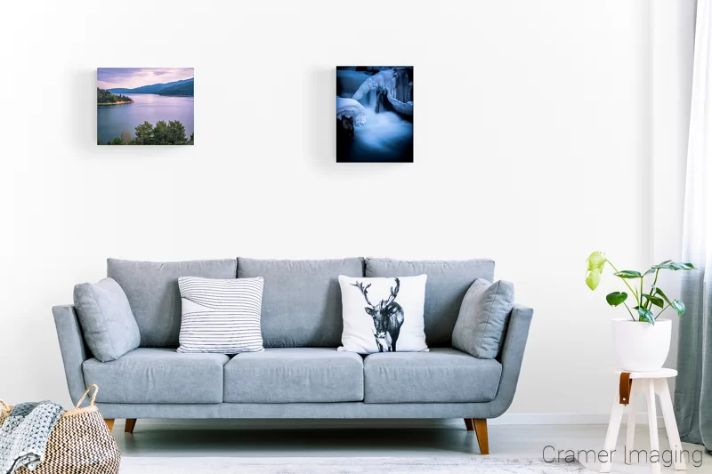 Image of a couple 16x20 landscape photo prints on the wall of a lounge