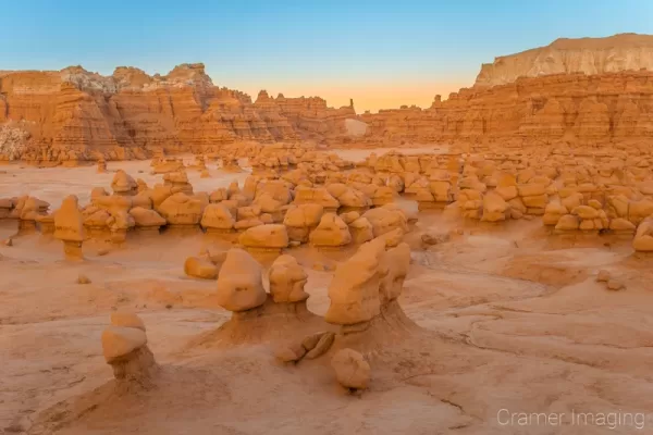 Cramer Imaging's fine art landscape photograph of orange mushroom-shaped hoodoo rocks at sunset at Goblin Valley State Park Utah