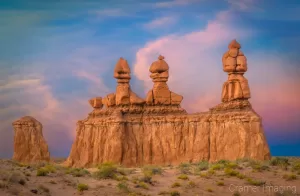 Cramer Imaging's fine art landscape photograph of the orange hoodoo rock formation called Three Sisters at sunset at Goblin Valley State Park Utah