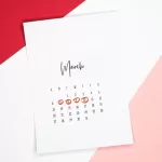 Calendar of the month of March with 4 dates circled on a colored background