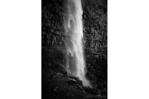 Cramer Imaging's fine art landscape black and white or monochromatic photograph of a waterfall cascading down in Twin Falls Idaho