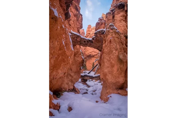 Cramer Imaging's fine art landscape photograph of two Bridges in winter with snow at Bryce Canyon National Park Utah
