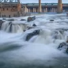 Cramer Imaging's fine art landscape photo of the American Falls reservoir spillway and Snake River full of silky smooth water