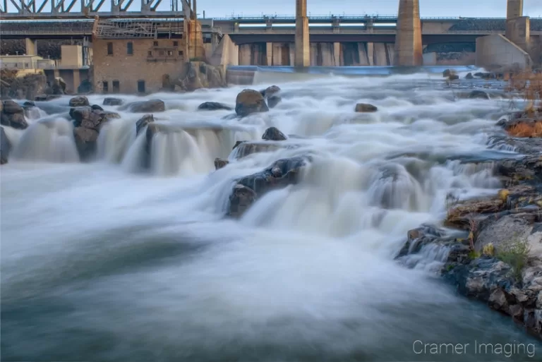 Cramer Imaging's fine art landscape photo of the American Falls reservoir spillway and Snake River full of silky smooth water