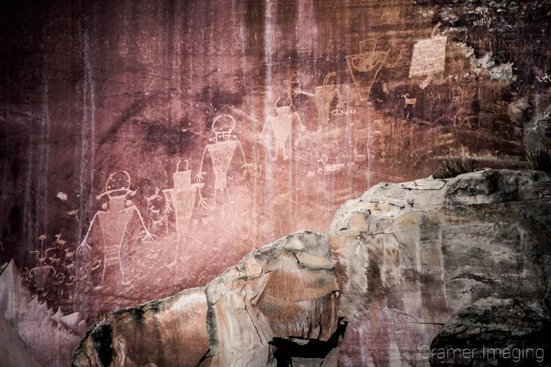 Audrey Cramer Photography's photograph of ancient Native American pictographs carved on the rock walls of Capitol Reef National Park, Utah
