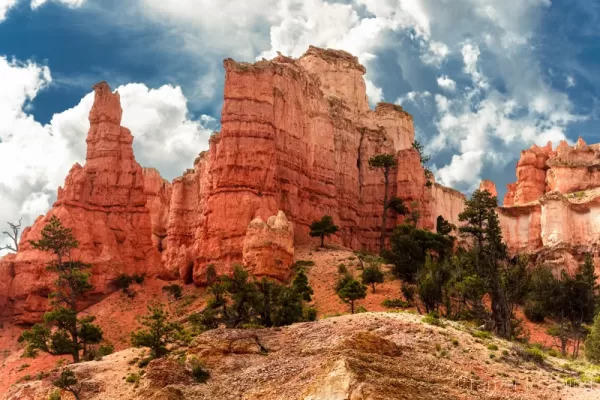 Cramer Imaging's professional quality landscape photograph of red rock formations and dramatic sky in Bryce Canyon National Park, Utah