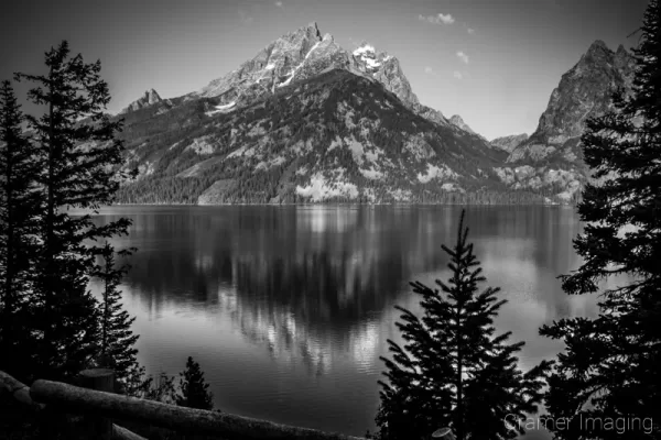 Cramer Imaging's quality black and white landscape photograph of Jenny Lake reflecting the mountains in Grand Teton National Park Wyoming