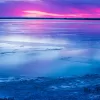 Cramer Imaging's fine art landscape photograph of the American Falls, Idaho reservoir in the winter at sunset