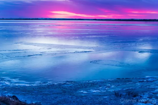 Cramer Imaging's fine art landscape photograph of the American Falls, Idaho reservoir in the winter at sunset