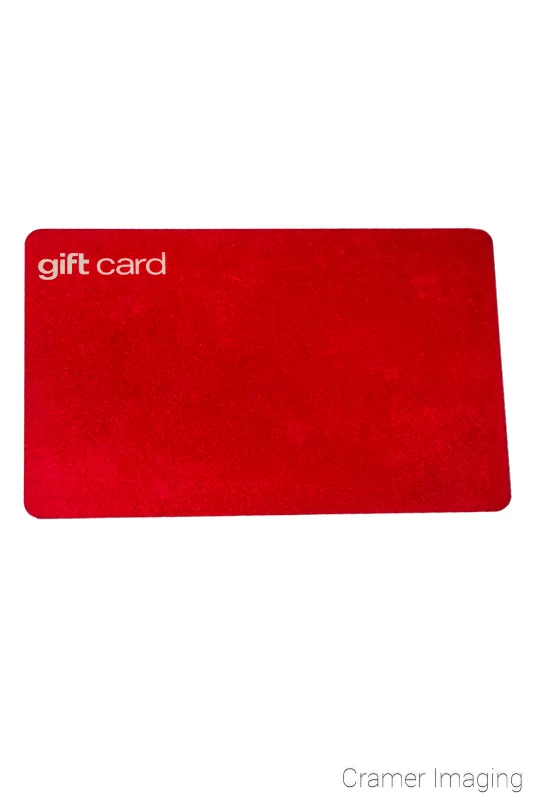 Cramer Imaging's professional quality photograph of a red gift card on a white background