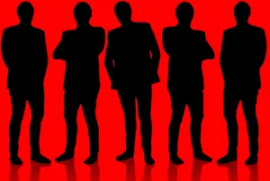 Graphic of men standing in silhouette against a red background