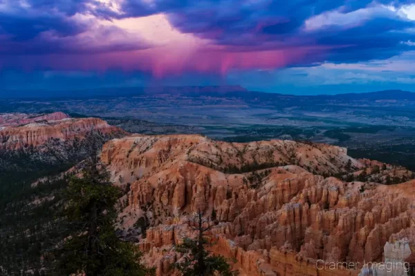 Cramer Imaging's fine art landscape photograph of dramatic stormy skies at Bryce Point of Bryce Canyon Utah at sunset