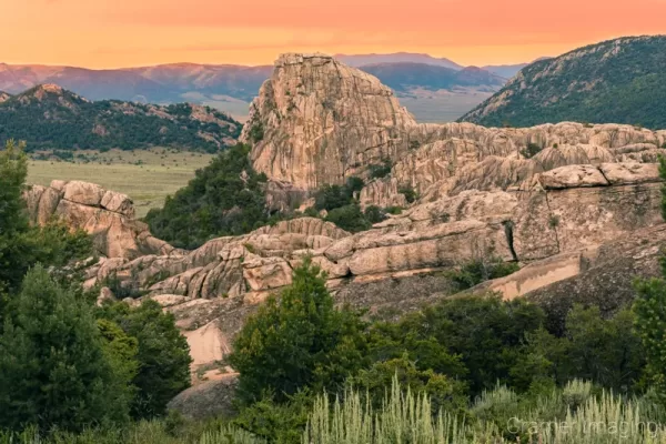 Cramer Imaging's professional quality landscape photograph of a large rock formation at sunset in City of Rocks National Reserve, Idaho
