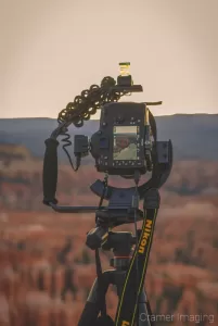 Cramer Imaging's photograph of a camera on a tripod taking a picture at Bryce Canyon National Park Utah at sunrise