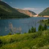 Cramer Imaging's quality landscape photograph of Quake Lake or Earthquake Lake in with the hills and forest in Montana