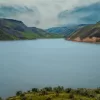 Cramer Imaging's quality landscape photograph of Ririe Reservoir with cloudy skies and choppy lake water in Idaho