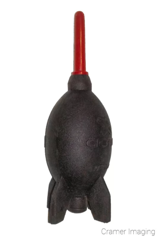Audrey Cramer Photography's photograph of a rocket-shaped air bulb for cleaning cameras on a white background