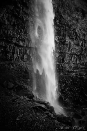 Cramer Imaging's fine art landscape black and white or monochromatic photograph of a waterfall cascading down in Twin Falls Idaho