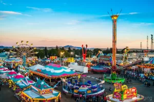 Cramer Imaging's professional quality fine art photograph of aerial view of Eastern Idaho State Fair carnival in Blackfoot, Bingham, Idaho at sunset