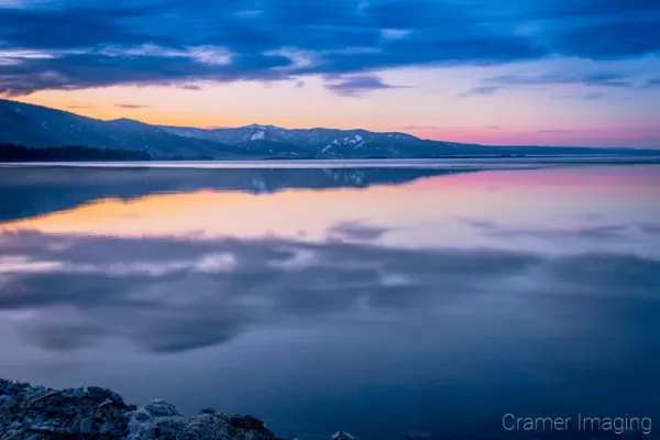 Cramer Imaging's professional quality landscape photograph of Henry's Lake at sunrise or dawn with a water reflection