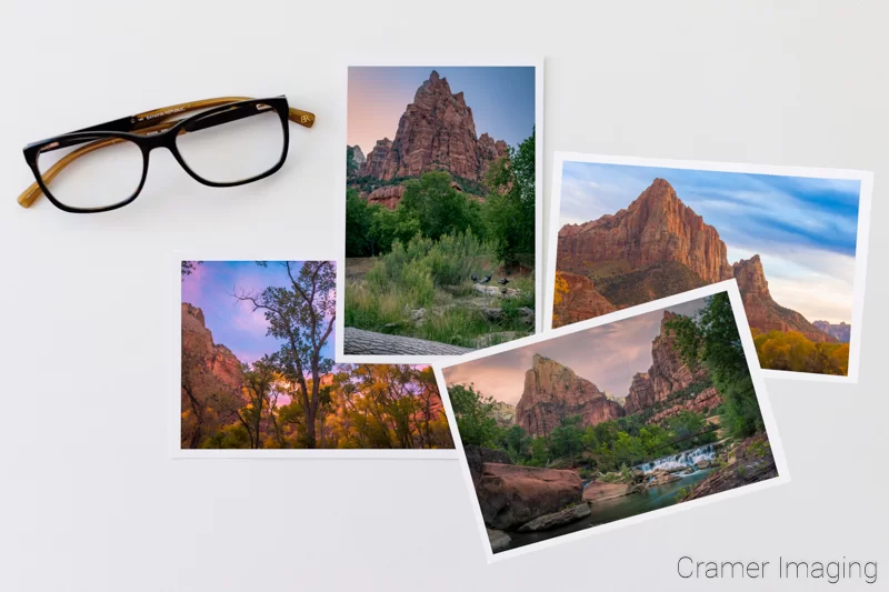Audrey Cramer Photography's staged photo of four landscape prints of Zion National Park on white background with glasses
