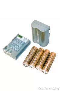 Photograph of three different kinds of camera batteries as done by Cramer Imaging