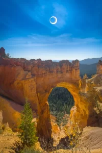 Cramer Imaging's fine art landscape photograph of an annular eclipse or ring of fire over Bryce Canyon's Natural Bridge formation