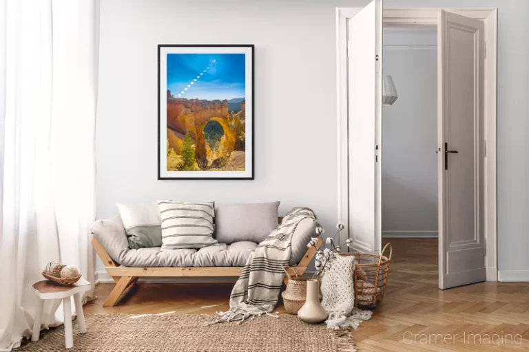 Photograph of Cramer Imaging's landscape photo "Centennial Ring of Fire Timelapse" in a cozy neutral-toned living room