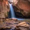 Cramer Imaging's fine art landscape photograph of waterfall upstream from Kanarra Falls near Kanarraville Utah with silky water