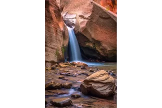 Cramer Imaging's fine art landscape photograph of waterfall upstream from Kanarra Falls near Kanarraville Utah with silky water