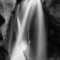 Cramer Imaging's fine art landscape close-up monochrome or black and white photograph of Kanarra Falls near Kanarraville Utah with silky water