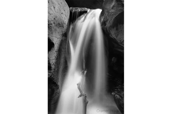 Cramer Imaging's fine art landscape close-up monochrome or black and white photograph of Kanarra Falls near Kanarraville Utah with silky water