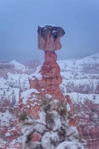 Cramer Imaging's fine art landscape photograph of a frozen snowy landscape with Thor's Hammer hoodoo in Bryce Canyon National Park Utah