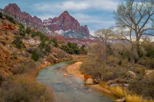 Cramer Imaging's fine art landscape photograph of the Watchman mountain and Virgin River in winter at Zion National Park Utah