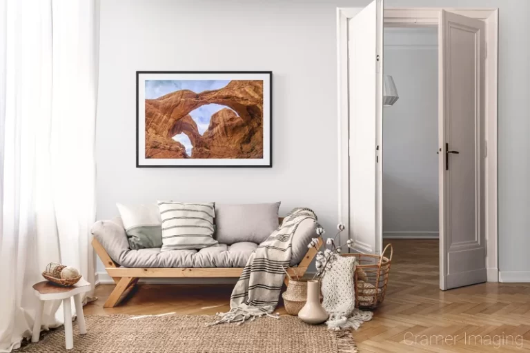 Photograph of Cramer Imaging's landscape photo "Double Arch" in a cozy neutral-toned living room