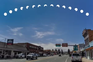 Fine art landscape photograph of the April 8, 2024 total solar eclipse depicted as a partial eclipse timelapse over Panguitch, Utah by Cramer Imaging