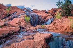 Fine art landscape photograph of silky water flowing down the waterfall of Gunlock State Park, Utah by Cramer Imaging