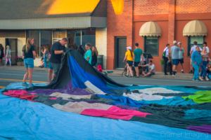 Cramer Imaging's fine art photograph of a hot air balloon team preparing a balloon for a balloon glow in Panguitch, Utah