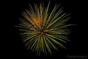 Cramer Imaging's fine art photograph of cool-toned fireworks in the sky