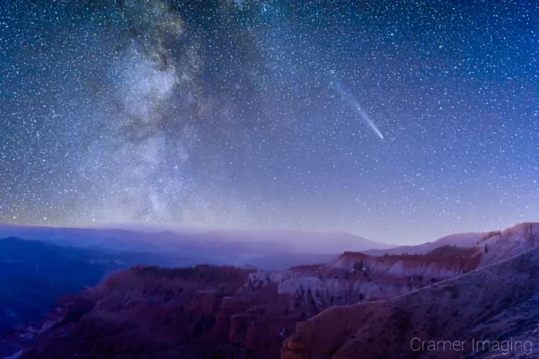 Cramer Imaging's fine art landscape photograph of the Milky Way and the C/2023 A3 Tsuchinshan-ATLAS comet over a slightly snowy Cedar Breaks National Monument, Utah